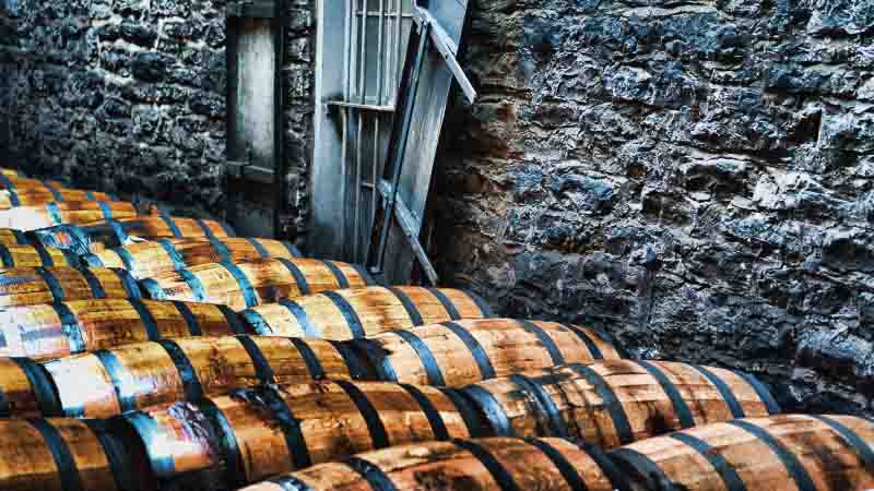 Bourbon whiskey /bÉœËrbÉ™n/ is a type of American whiskey, a barrel-aged distilled spirit made primarily from corn. The name derives from the French Bourbon dynasty, although the precise inspiration for the whiskey's name is unsettled; contenders include Bourbon County in Kentucky and Bourbon Street in New Orleans.[1] Bourbon has been distilled since the 18th century.[2] The use of the term 